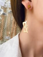 gold-steel-masquerade-mask-dangle-earrings
