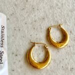 gold-steel-wavy-deformed-hoop-earrings