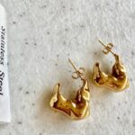 gold-steel-liquid-metal-hoop-earrings